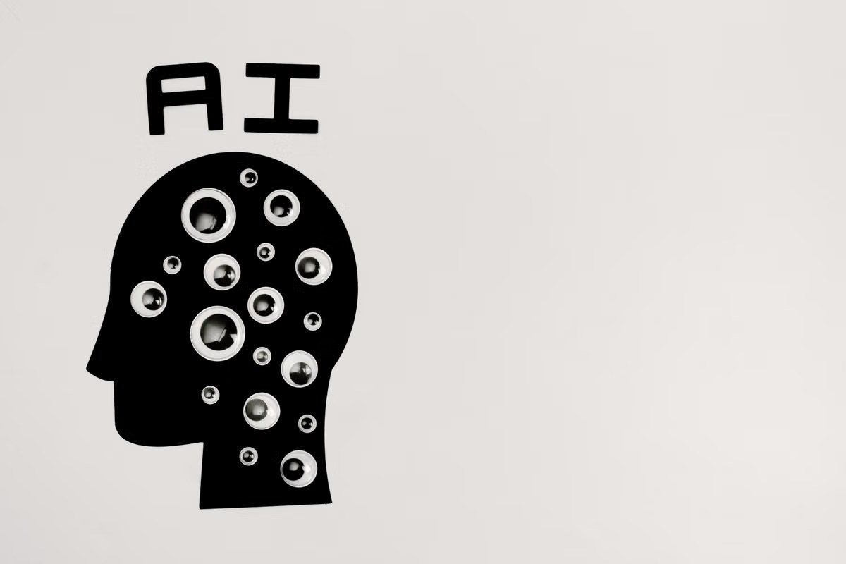 Creator working with AI tools on a laptop